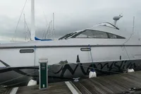 Custom VSV 2007 yacht docked at marina, overcast sky, side view.