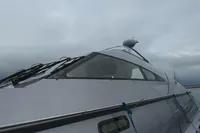 Custom VSV 2007 yacht with sleek design against cloudy sky.