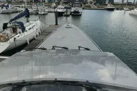 Custom VSV 2007 boat docked in a marina with other vessels.