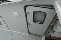 Boat interior with a closed hatch door, Custom VSV model, 2007.