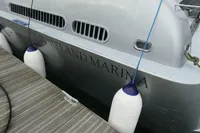 Custom VSV 2007 yacht docked at Portland Marina with fenders.