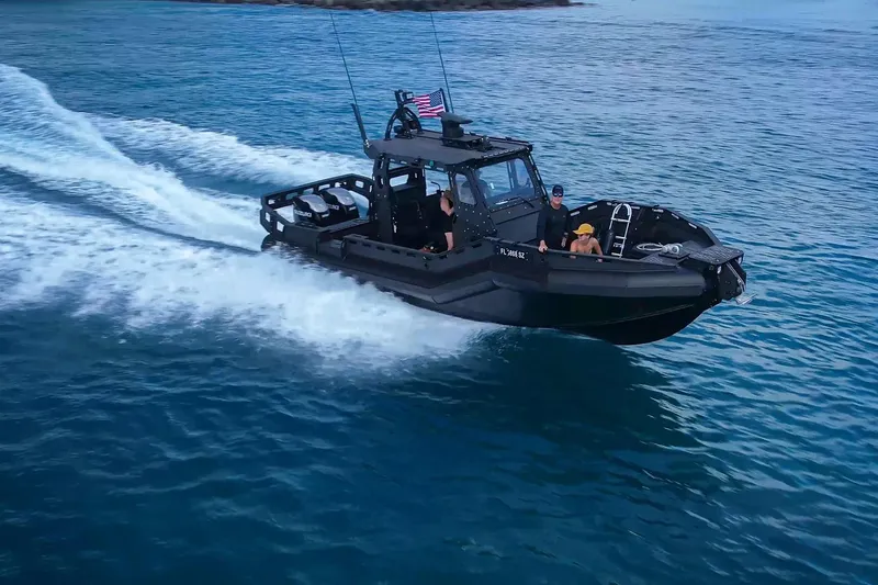  Yacht Photos Pics High-speed DGS 777 Military Version boat cruising on blue ocean waters, 2022 model.