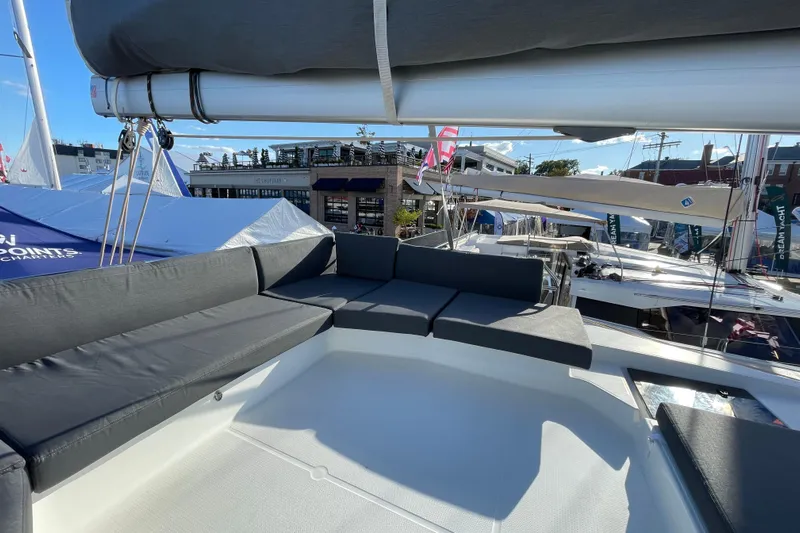 Zensation Yacht Photos Pics 2023 Fountaine Pajot Tanna 47 catamaran with spacious outdoor seating area.