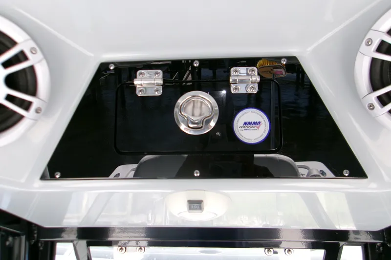  Yacht Photos Pics 2024 Sportsman Masters 267OE Bay Boat dashboard with speakers and NMMA certification.