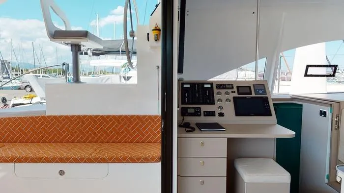 Ti Marin Yacht Photos Pics Interior view of 2020 O Yachts Class 6, featuring navigation controls and seating.