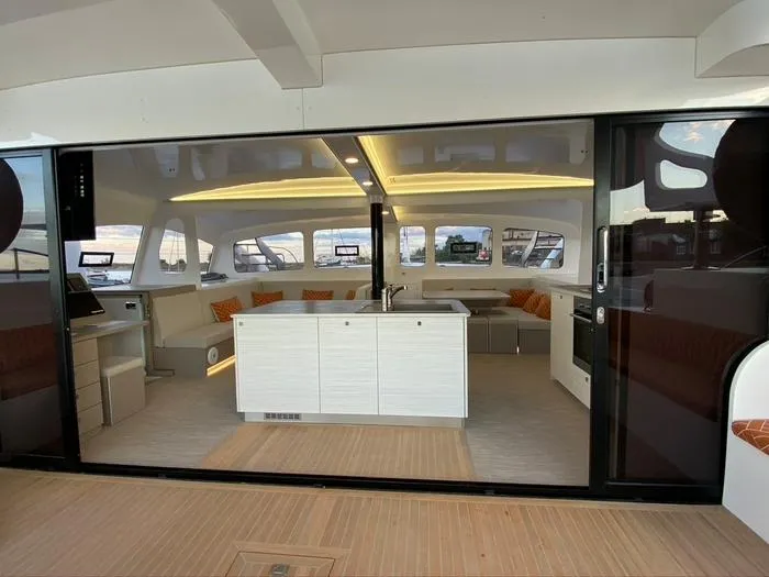Ti Marin Yacht Photos Pics Interior of 2020 O Yachts Class 6, featuring modern design and spacious seating area.