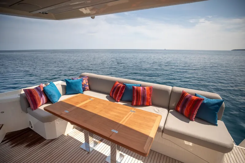  Yacht Photos Pics Luxurious seating area on 2020 Prestige 590 Flybridge Cruiser with ocean view.