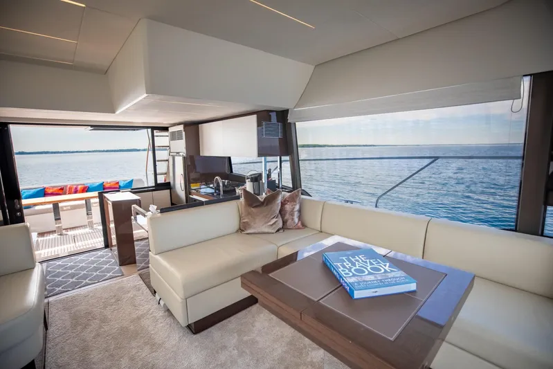  Yacht Photos Pics Luxurious interior of 2020 Prestige 590 Flybridge Cruiser with ocean view.