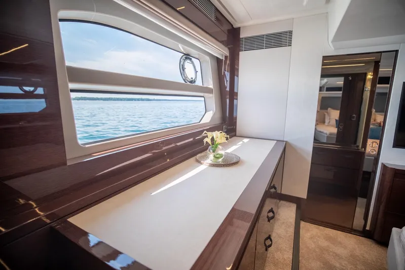  Yacht Photos Pics Luxurious interior of 2020 Prestige 590 Flybridge Cruiser with ocean view window.