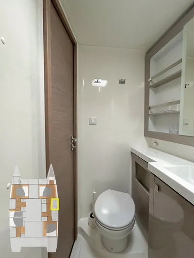  Yacht Photos Pics 2023 Fountaine Pajot Tanna 47 yacht bathroom with modern fixtures and compact design.