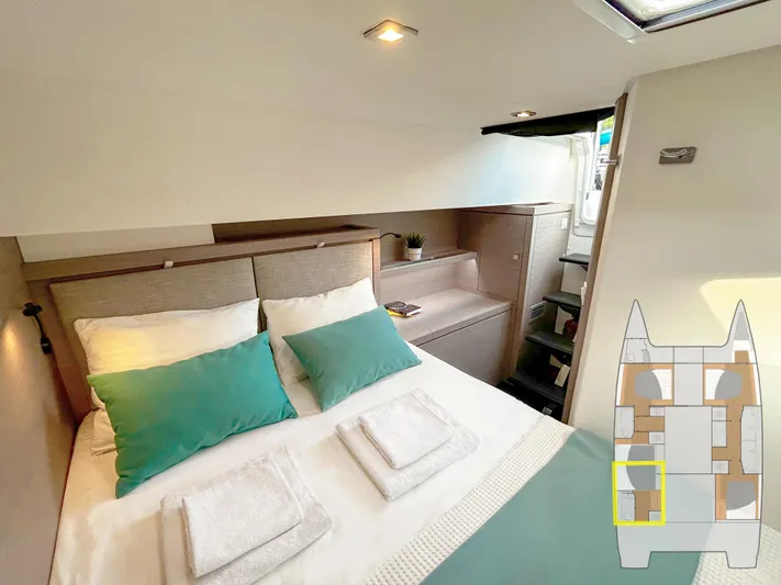  Yacht Photos Pics Luxurious bedroom interior of 2023 Fountaine Pajot Tanna 47 catamaran with modern design.