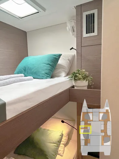  Yacht Photos Pics 2023 Fountaine Pajot Tanna 47 cabin interior with modern bedding and decor.