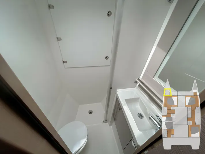  Yacht Photos Pics Bathroom interior of 2023 Fountaine Pajot Tanna 47 yacht, featuring modern fixtures.