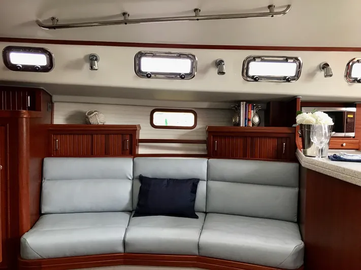 Salacia Yacht Photos Pics Luxurious interior of 2016 Blue Jacket 40 yacht with elegant seating and wood accents.