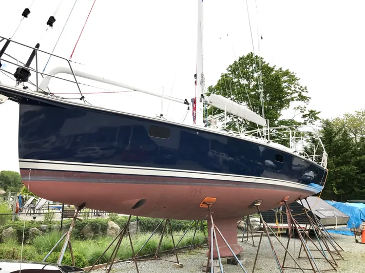 Salacia Yacht Photos Pics Blue Jacket 40 sailboat on stands, 2016 model, with blue hull and white deck.