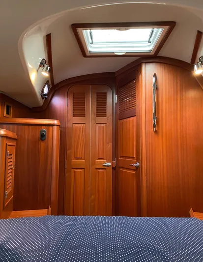 Salacia Yacht Photos Pics Interior of 2016 Blue Jacket 40 sailboat with wooden cabinetry and skylight.
