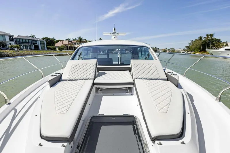 Bradventures Yacht Photos Pics 2023 Cruisers Yachts 42 Cantius with luxurious deck seating on a sunny day.