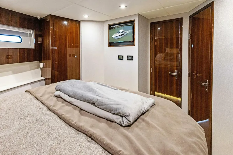 Bradventures Yacht Photos Pics Luxurious interior of 2023 Cruisers Yachts 42 Cantius with elegant wood finishes.