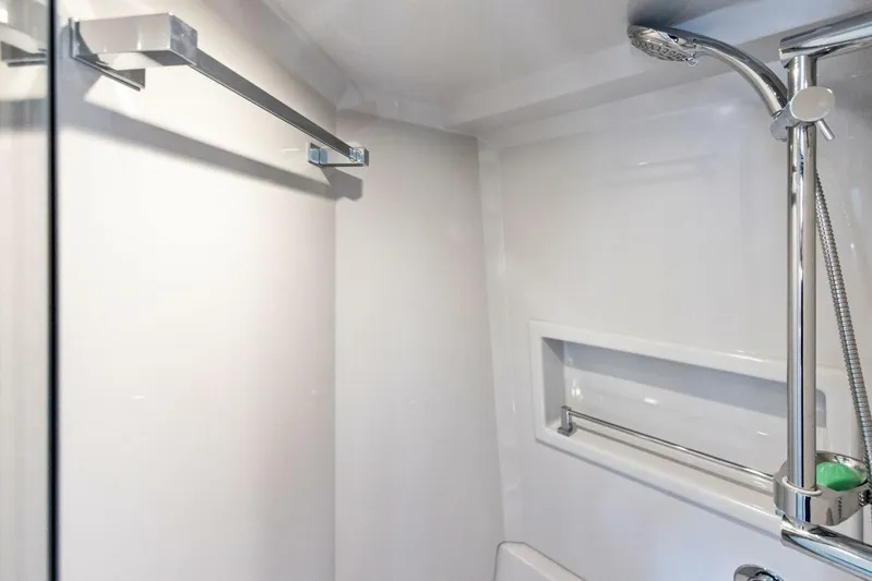 Bradventures Yacht Photos Pics 2023 Cruisers Yachts 42 Cantius bathroom with modern shower and sleek design.