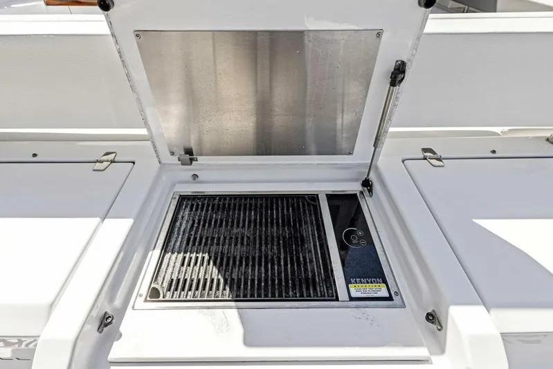 Bradventures Yacht Photos Pics Outdoor grill on 2023 Cruisers Yachts 42 Cantius, featuring a sleek, modern design.