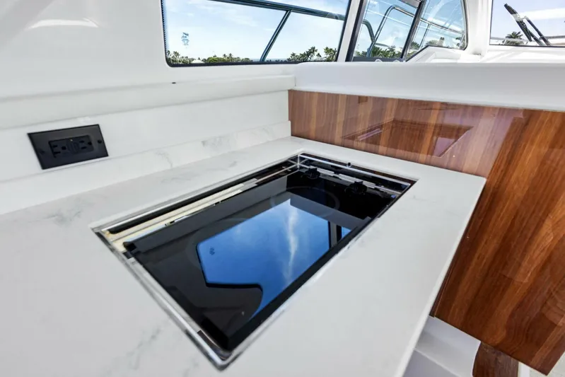 Bradventures Yacht Photos Pics 2023 Cruisers Yachts 42 Cantius interior with sleek countertop and built-in appliance.