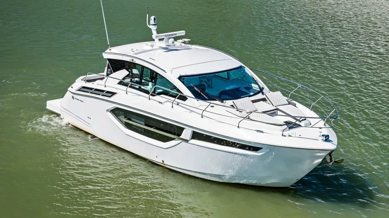 Bradventures Yacht Photos Pics 2023 Cruisers Yachts 42 Cantius luxury boat cruising on water.