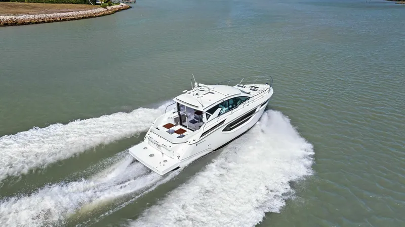 Bradventures Yacht Photos Pics 2023 Cruisers Yachts 42 Cantius cruising on open water, showcasing sleek design and performance.