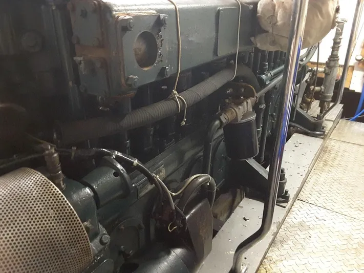 Orina Yacht Photos Pics Engine room of 1971 Southern Marine MALAHIDE Pilothouse LRC, showcasing mechanical components.