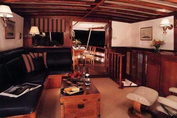 Orina Yacht Photos Pics Luxurious interior of 1971 Southern Marine MALAHIDE Pilothouse LRC with elegant wood finishes.