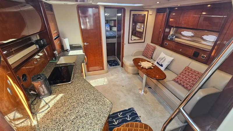  Yacht Photos Pics Luxurious interior of 2005 Sea Ray 390 Sundancer yacht with modern amenities.