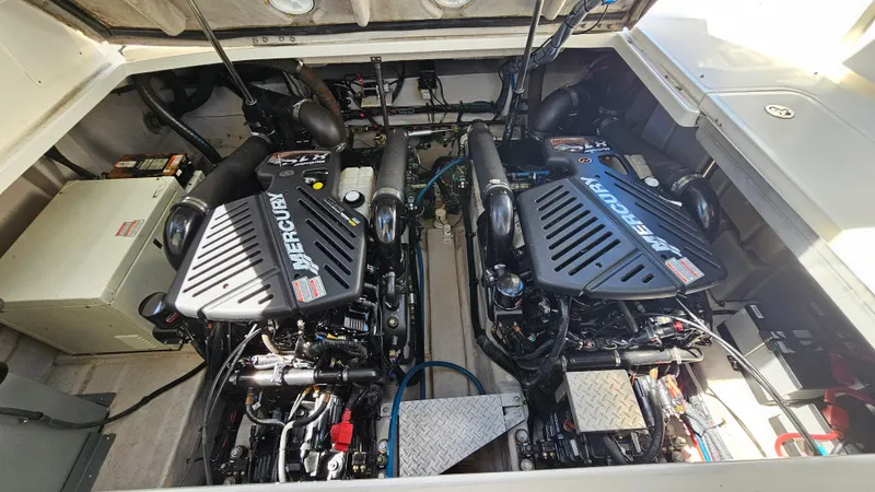  Yacht Photos Pics Engine compartment of a 2005 Sea Ray 390 Sundancer with twin Mercury engines.