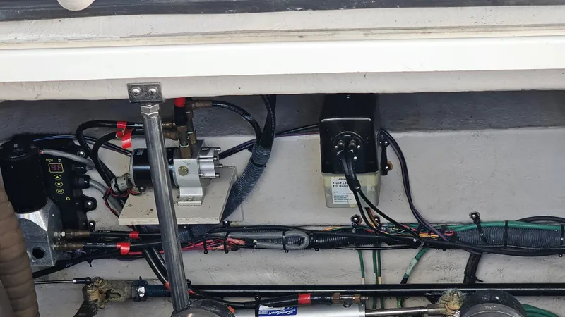  Yacht Photos Pics Engine compartment of a 2005 Sea Ray 390 Sundancer with visible wiring and components.