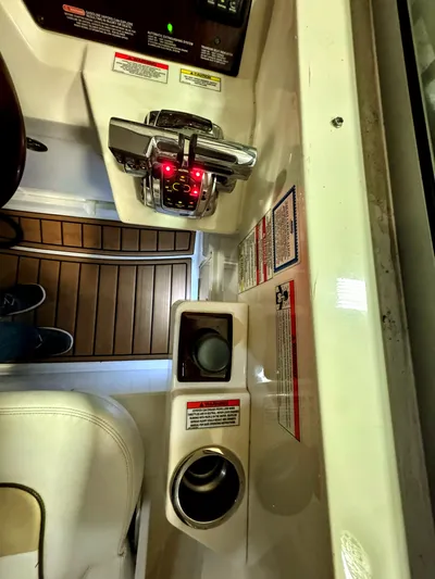 Josh'd Yacht Photos Pics Sea Ray Sundancer 310, 2010 model, control panel with switches and wood flooring.