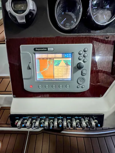 Josh'd Yacht Photos Pics Raymarine GPS on 2010 Sea Ray Sundancer 310 dashboard.