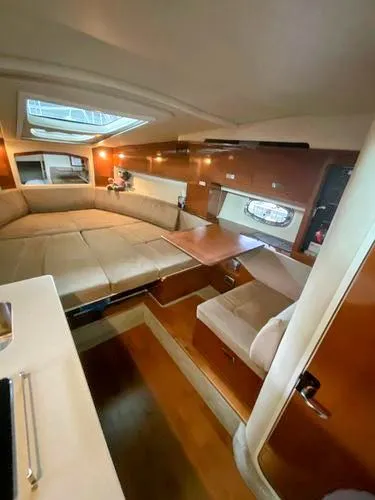 Josh'd Yacht Photos Pics Interior of a 2010 Sea Ray Sundancer 310 yacht with elegant furnishings.