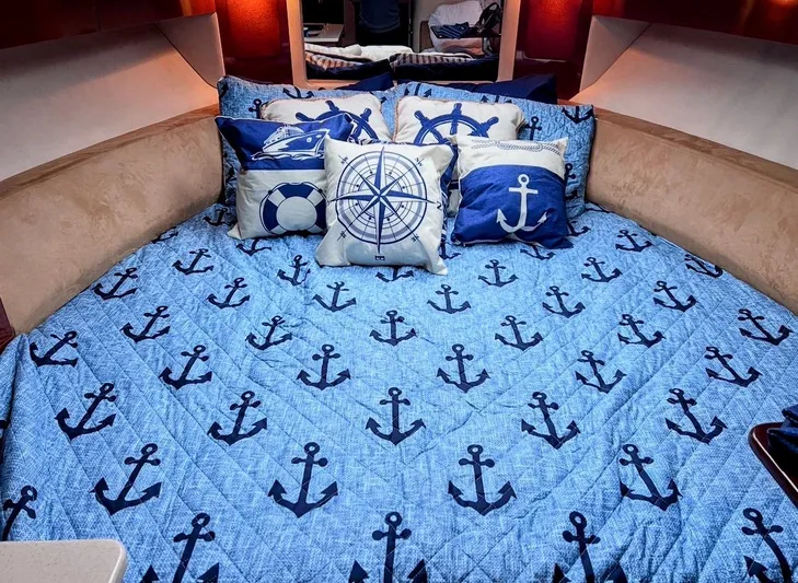 Josh'd Yacht Photos Pics Nautical-themed bed in a 2010 Sea Ray Sundancer 310 yacht.