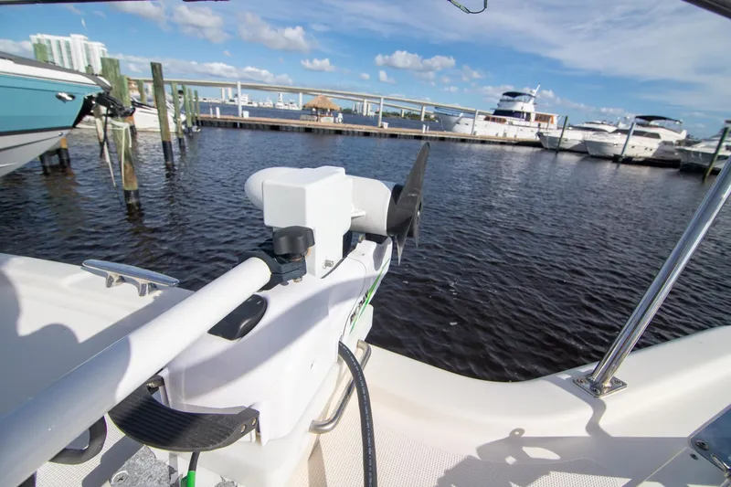 Let&rsquo;s Go II Yacht Photos Pics 2013 Pursuit OS 345 Offshore boat docked at marina with clear blue sky.