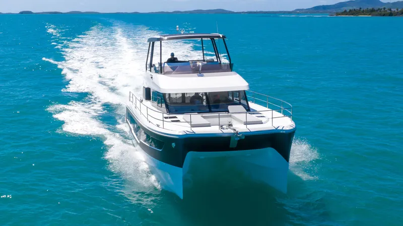 Just The Tip Yacht Photos Pics 2020 Fountaine Pajot MY 40 cruising on clear blue water.