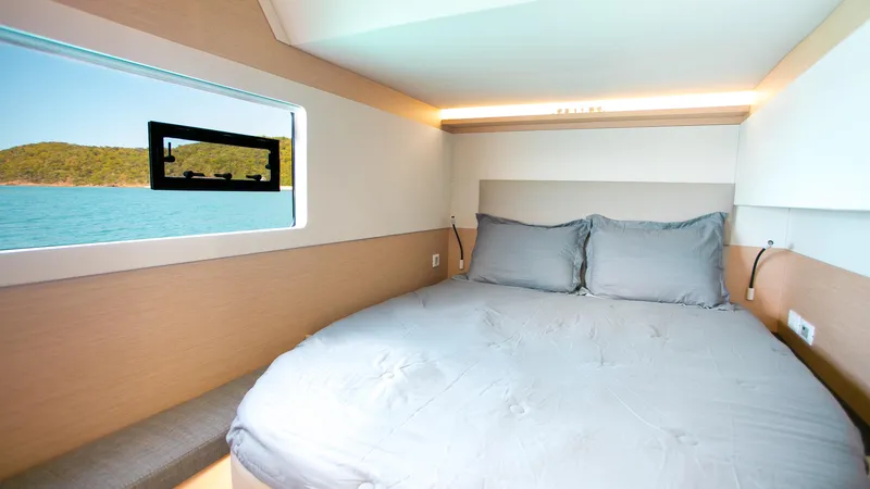 Just The Tip Yacht Photos Pics Luxurious cabin interior of 2020 Fountaine Pajot MY 40 yacht with scenic window view.