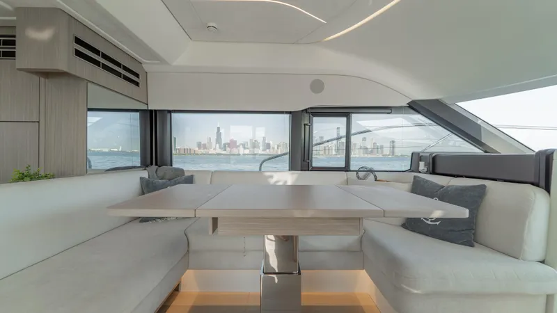  Yacht Photos Pics Luxurious interior of 2025 Prestige F4.9 yacht with city skyline view.
