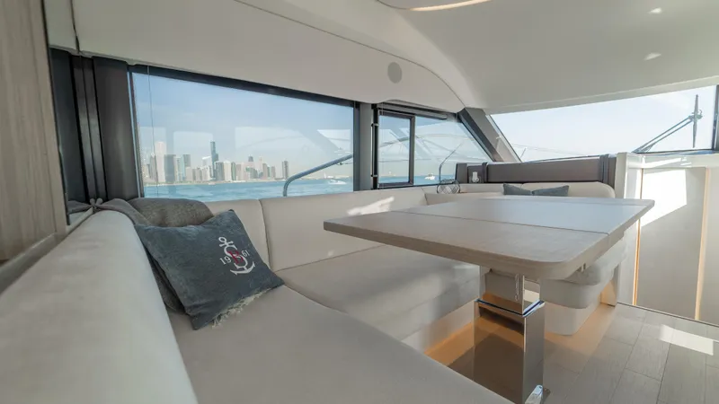  Yacht Photos Pics Luxurious interior of 2025 Prestige F4.9 yacht with city skyline view.