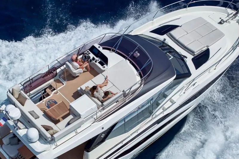  Yacht Photos Pics Prestige F4.9 yacht cruising on ocean, aerial view, 2026 model.