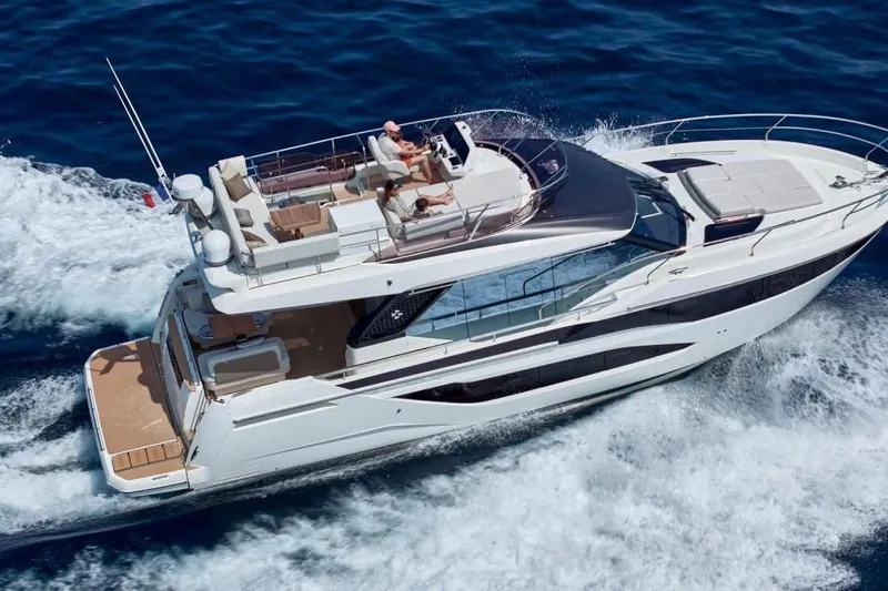  Yacht Photos Pics Luxury yacht Prestige F4.9 cruising on open sea, 2026 model.