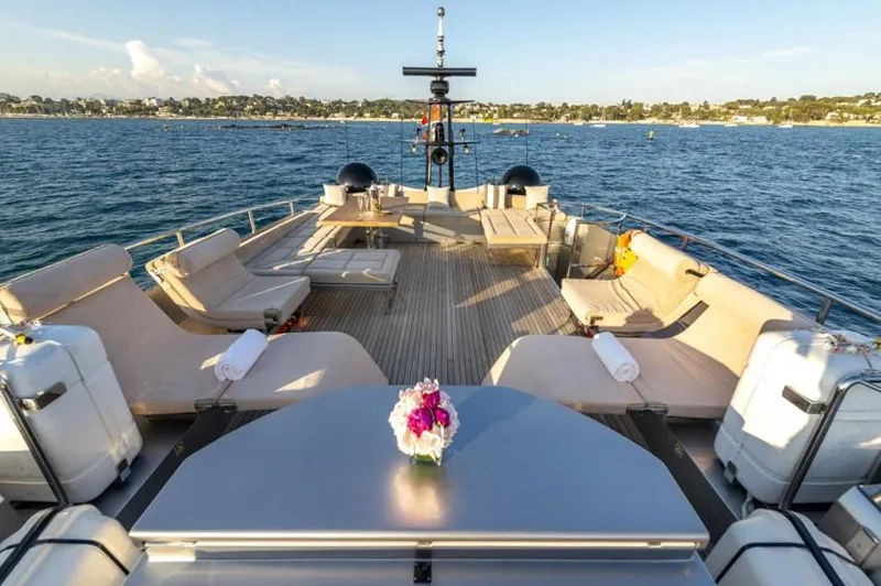  Yacht Photos Pics Luxurious 2013 Pershing 108 yacht deck with sun loungers and ocean view.