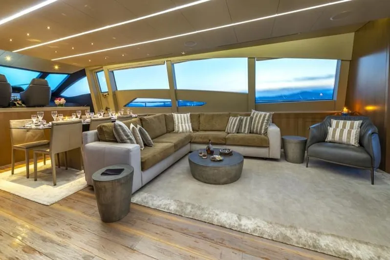  Yacht Photos Pics Luxurious interior of 2013 Pershing 108 yacht with elegant seating and dining area.