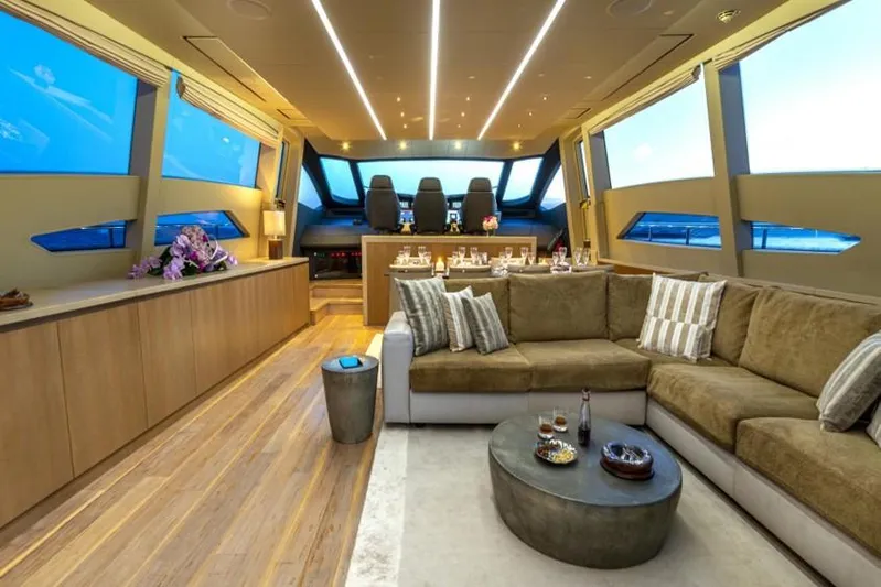  Yacht Photos Pics Luxurious interior of 2013 Pershing 108 yacht with modern seating and elegant decor.