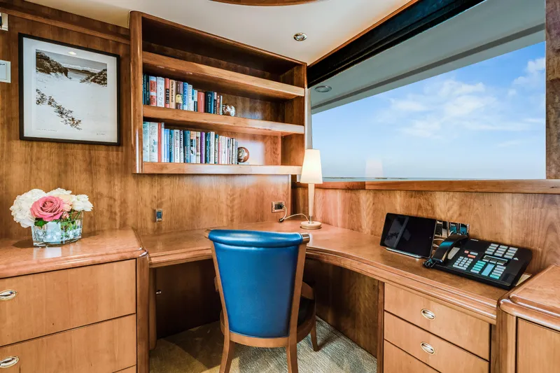 Avalina Yacht Photos Pics Luxurious yacht office with wooden desk, bookshelves, and ocean view, Westport 2003 model.