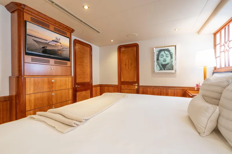 Avalina Yacht Photos Pics Luxurious 2003 Westport yacht bedroom with elegant wood finishes and modern decor.