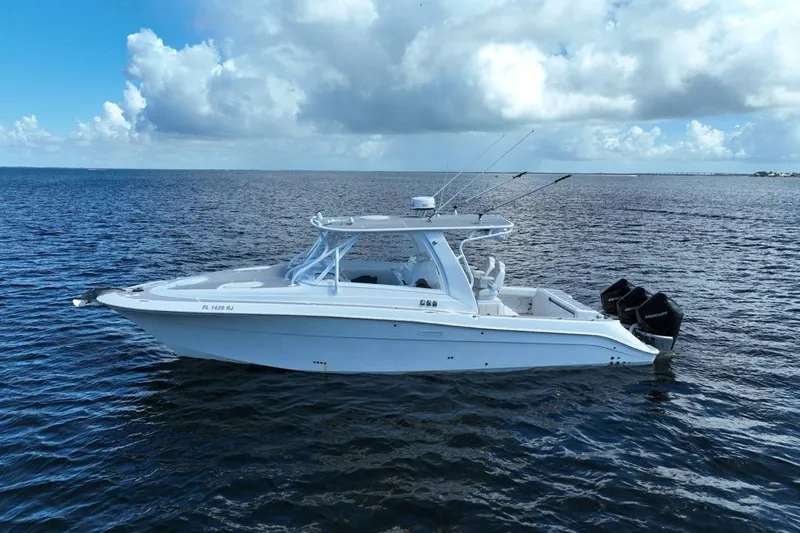  Yacht Photos Pics 2008 Hydra-Sports Vector 3500 VX boat on open water under a cloudy sky.