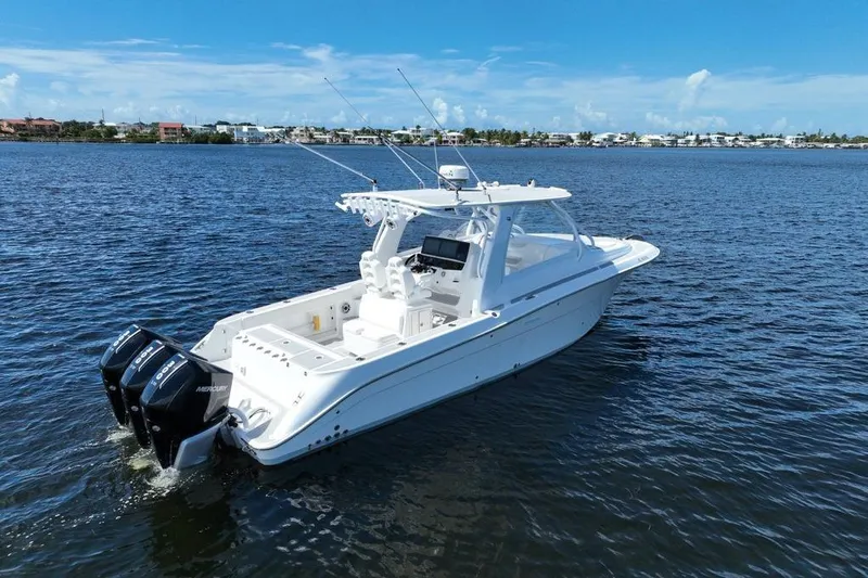  Yacht Photos Pics 2008 Hydra-Sports Vector 3500 VX boat on calm water, featuring dual Mercury engines.